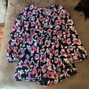 Long sleeve floral romper. Never worn, only to try on.